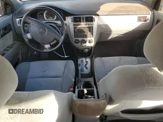 2005 Suzuki Forenza Premium z VIN KL5JJ56Z65K093127, wystawiony jako Copart lot #87691665 z przebiegiem 178 868 mil mil oraz Szkody całkowita. Historia ofert i sprzedaży dostępna na DreamBid. Obrazek 8.