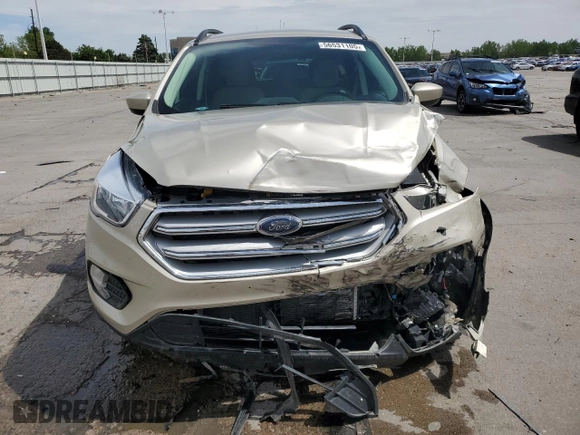 2018 Ford Escape SE z VIN 1FMCU9GD5JUC08024, wystawiony jako Copart lot #56531105 z przebiegiem 54 104 mil mil oraz Szkoda całkowita • Salvage title. Historia ofert i sprzedaży dostępna na DreamBid. Obrazek 5.