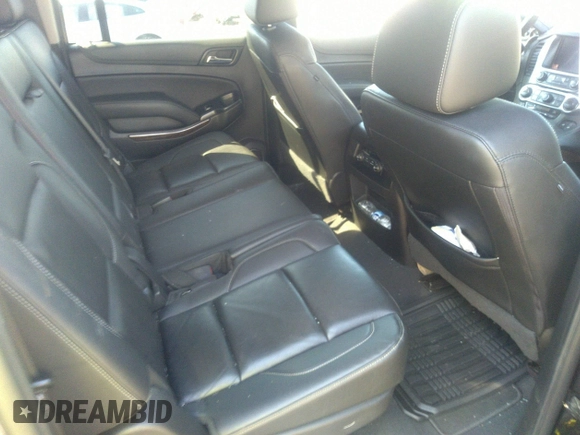 2019 Chevrolet Suburban LT with VIN 1GNSCHKCXKR405939, listed as a IAAI auction lot 41591475 with 106,554 mi miles and . Bid and sale history available at DreamBid. Image 8.