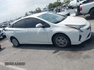 2016 Toyota Prius Two z VIN JTDKBRFU3G3024092, wystawiony jako IAAI lot #42338381 z przebiegiem 87 216 mil mil oraz . Historia ofert i sprzedaży dostępna na DreamBid. Obrazek 13.