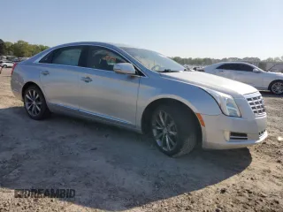 2013 Cadillac XTS Luxury with VIN 2G61P5S34D9100119, listed as a Copart auction lot 52525975 with 153,977 mi miles and Clean Title. Bid and sale history available at carsss.com. Image 4.