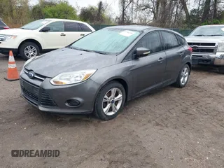 2013 Ford Focus SE with VIN 1FADP3K2XDL121660, listed as a IAAI auction lot 41984336 with 166,295 mi miles. Bid and sale history available at carsss.com. Image 2.