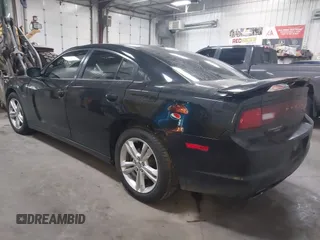 2011 Dodge Charger RT Plus with VIN 2B3CM5CT2BH521841, listed as a IAAI auction lot 41571696 with 186,120 mi miles. Bid and sale history available at carsss.com. Image 3.