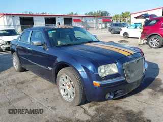 2005 Chrysler 300 300C AWD z VIN 2C3AK63H05H672425, wystawiony jako IAAI lot #42224241 z przebiegiem 143 185 mil mil oraz . Historia ofert i sprzedaży dostępna na DreamBid. Obrazek 1.
