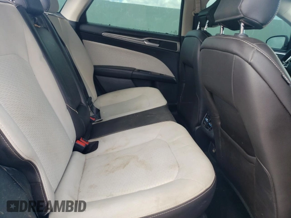 2020 Ford Fusion SE z VIN 3FA6P0HD9LR148574, wystawiony jako Copart lot #56694155 z przebiegiem 89 994 mil mil oraz Szkoda całkowita • Salvage title. Historia ofert i sprzedaży dostępna na DreamBid. Obrazek 10.