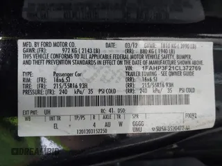 2012 Ford Focus SE with VIN 1FAHP3F21CL372769, listed as a IAAI auction lot 42107424 with 202,142 mi miles. Bid and sale history available at carsss.com. Image 9.