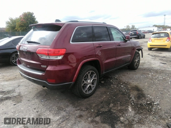 2018 Jeep Grand Cherokee Limited with VIN 1C4RJFBG8JC251169, listed as a IAAI auction lot 40423582 with 68,793 mi miles and . Bid and sale history available at DreamBid. Image 4.