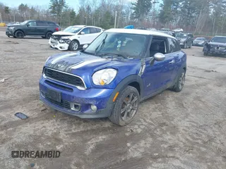 2014 MINI Paceman S with VIN WMWSS7C51EWN72179, listed as a IAAI auction lot 41823211 with 117,151 mi miles and . Bid and sale history available at DreamBid. Image 2.