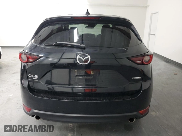 2021 Mazda CX-5 Touring with VIN JM3KFBCMXM0338844, listed as a Copart auction lot 53201615 with 137,498 mi miles and Clean Title. Bid and sale history available at carsss.com. Image 6.