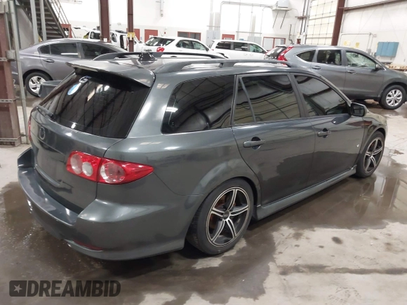 2005 Mazda 6 Sport S with VIN 1YVHP82D555M08964, listed as a IAAI auction lot 41594225 with 131,595 mi miles and . Bid and sale history available at DreamBid. Image 4.