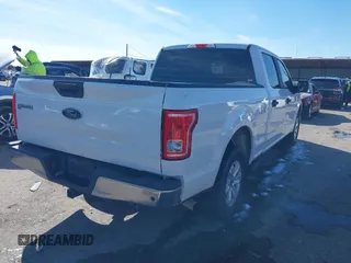 2015 Ford F-150 XL with VIN 1FTEW1CG5FFA61157, listed as a IAAI auction lot 41299436 with 145,310 mi miles. Bid and sale history available at carsss.com. Image 4.
