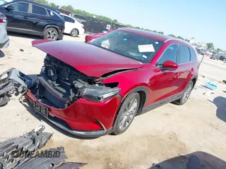 2021 Mazda CX-9 Signature with VIN JM3TCBEY9M0500122, listed as a IAAI auction lot 42252561 with 46,154 mi miles and . Bid and sale history available at DreamBid. Image 17.