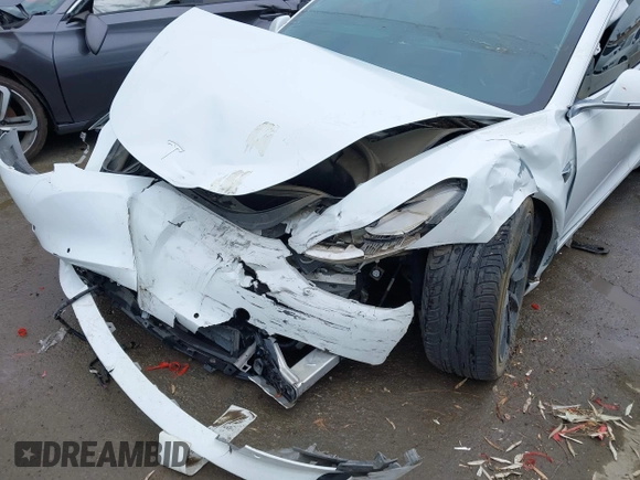 2018 Tesla Model 3 Long Range Battery with VIN 5YJ3E1EA1JF038751, listed as a IAAI auction lot 40553966 with 95,753 mi miles and . Bid and sale history available at DreamBid. Image 6.