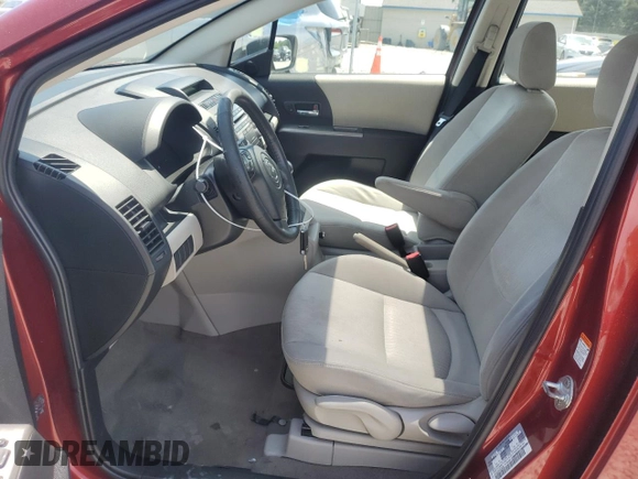 2009 Mazda 5 Sport with VIN JM1CR293X90338238, listed as a Copart auction lot 56184135 with 175,105 mi miles and Clean Title. Bid and sale history available at DreamBid. Image 7.
