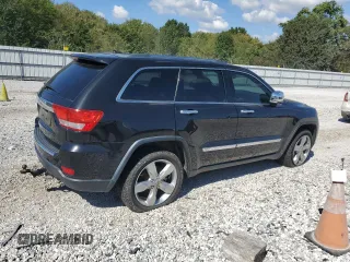 2013 Jeep Grand Cherokee Overland with VIN 1C4RJECG5DC595989, listed as a Copart auction lot 73385354 with 157,876 mi miles and Clean Title. Bid and sale history available at carsss.com. Image 3.
