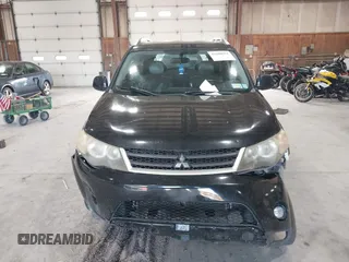 2007 Mitsubishi Outlander XLS z VIN JA4MT41X87Z001991, wystawiony jako IAAI lot #42200951 z przebiegiem 202 866 mil mil oraz . Historia ofert i sprzedaży dostępna na DreamBid. Obrazek 12.