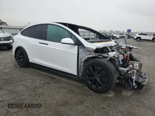 2023 Tesla Model X with VIN 7SAXCAE58PF379943, listed as a Copart auction lot 86352354 with Not Provided miles and Salvage Title. Bid and sale history available at DreamBid. Image 4.