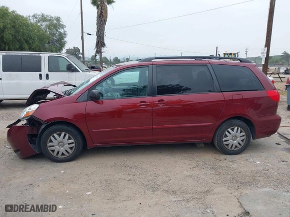 2009 Toyota Sienna CE with VIN 5TDZK23C69S254244, listed as a IAAI auction lot 41888678 with 208,622 mi miles. Bid and sale history available at carsss.com. Image 14.