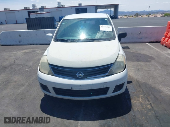 2011 Nissan Versa 1.8 S with VIN 3N1BC1CP0BL452473, listed as a IAAI auction lot 42171311 with 167,018 mi miles. Bid and sale history available at carsss.com. Image 6.