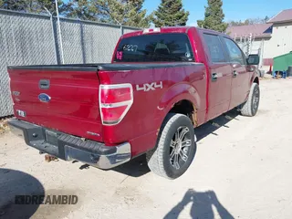 2014 Ford F-150 XL with VIN 1FTFW1EF7EFA32296, listed as a IAAI auction lot 41986227 with 206,050 mi miles. Bid and sale history available at carsss.com. Image 4.
