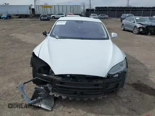 2016 Tesla Model S 70 kWh Battery with VIN 5YJSA1E15GF135841, listed as a IAAI auction lot 41846535 with 87,312 mi miles. Bid and sale history available at carsss.com. Image 13.