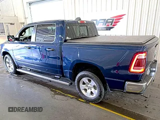 2023 Ram 1500 Big Horn with VIN 1C6RRFFG3PN574679, listed as a IAAI auction lot 42778239 with 107,217 mi miles and . Bid and sale history available at DreamBid. Image 1.