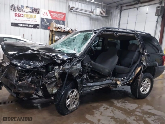 2004 Jeep Grand Cherokee Laredo with VIN 1J4GW48S34C387815, listed as a IAAI auction lot 41259911 with 1 mi miles. Bid and sale history available at carsss.com. Image 6.