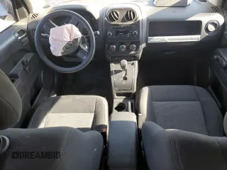 2014 Jeep Compass Sport with VIN 1C4NJCBA1ED717520, listed as a Copart auction lot 88745365 with 75,295 mi miles and Salvage Title. Bid and sale history available at carsss.com. Image 8.