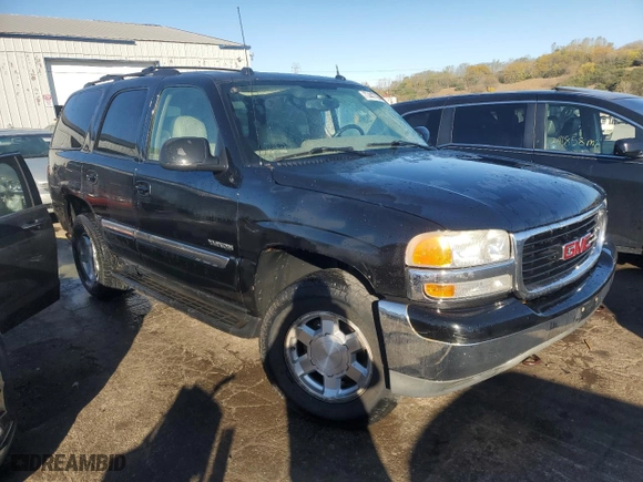 2005 GMC Yukon SLT with VIN 1GKEK13T05J107678, listed as a Copart auction lot 77447784 with 269,040 mi miles and Salvage Title. Bid and sale history available at carsss.com. Image 4.