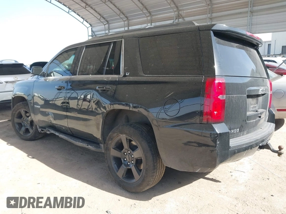 2019 Chevrolet Tahoe LT z VIN 1GNSCBKC0KR328639, wystawiony jako IAAI lot #41740284 z przebiegiem 111 734 mil mil oraz . Historia ofert i sprzedaży dostępna na DreamBid. Obrazek 3.