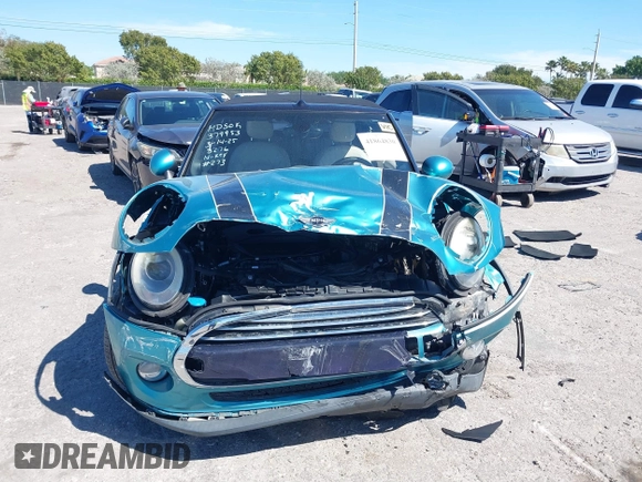 2016 MINI Convertible z VIN WMWWG5C5XG3A83276, wystawiony jako IAAI lot #41864830 z przebiegiem 103 721 mil mil oraz . Historia ofert i sprzedaży dostępna na DreamBid. Obrazek 6.