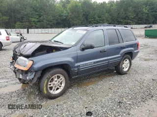 2004 Jeep Grand Cherokee Laredo z VIN 1J4GX48SX4C201569, wystawiony jako Copart lot #58631585 z przebiegiem 271 124 mil mil oraz Szkoda całkowita • Salvage title. Historia ofert i sprzedaży dostępna na DreamBid. Obrazek 1.