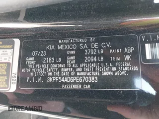 2023 Kia Forte GT-Line z VIN 3KPF54AD6PE670383, wystawiony jako IAAI lot #42020078 z przebiegiem 26 169 mil mil oraz . Historia ofert i sprzedaży dostępna na DreamBid. Obrazek 9.
