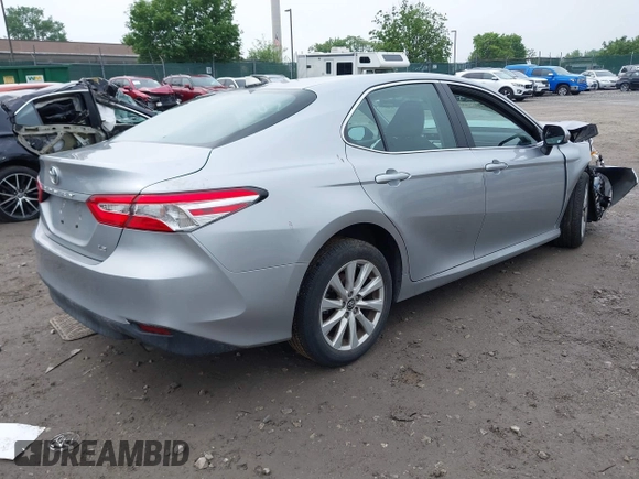 2019 Toyota Camry LE z VIN 4T1B11HK5KU813553, wystawiony jako IAAI lot #42282507 z przebiegiem 22 100 mil mil oraz . Historia ofert i sprzedaży dostępna na DreamBid. Obrazek 4.