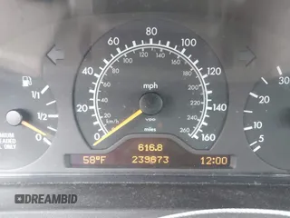 1997 Mercedes-Benz E-Class with VIN WDBJF55F3VJ034009, listed as a IAAI auction lot 41710225 with 239,673 mi miles. Bid and sale history available at carsss.com. Image 7.