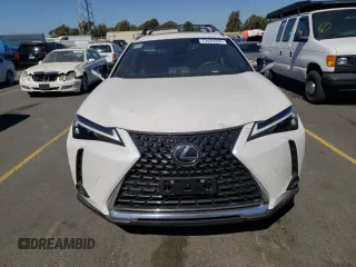 2024 Lexus UX with VIN JTHX6JBH3R2187983, listed as a Copart auction lot 73429324 with 14,549 mi miles and Salvage Title. Bid and sale history available at carsss.com. Image 5.