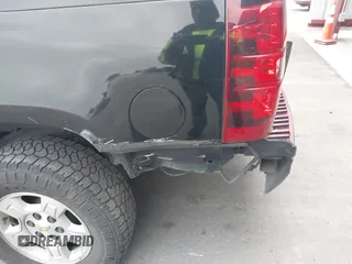 2007 Chevrolet Tahoe LS z VIN 1GNFC13C37J395803, wystawiony jako IAAI lot #42068163 z przebiegiem 273 156 mil mil oraz . Historia ofert i sprzedaży dostępna na DreamBid. Obrazek 6.