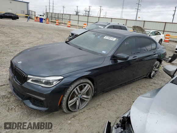 2018 BMW 7 Series 750i with VIN WBA7F0C55JGM23795, listed as a Copart auction lot 81168143 with 114,285 mi miles and Salvage Title. Bid and sale history available at carsss.com. Image 1.
