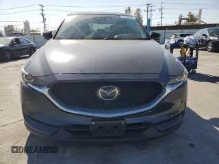 2019 Mazda CX-5 Touring with VIN JM3KFBCM0K0697813, listed as a Copart auction lot 52239505 with 49,844 mi miles and Salvage Title. Bid and sale history available at carsss.com. Image 5.