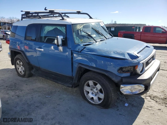 2011 Toyota FJ Cruiser with VIN JTEBU4BF1BK102982, listed as a Copart auction lot 47958985 with 215,418 mi miles and Salvage Title. Bid and sale history available at carsss.com. Image 4.