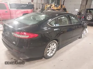 2020 Ford Fusion SE z VIN 3FA6P0HD2LR121250, wystawiony jako IAAI lot #42200163 z przebiegiem 161 111 mil mil oraz . Historia ofert i sprzedaży dostępna na DreamBid. Obrazek 4.