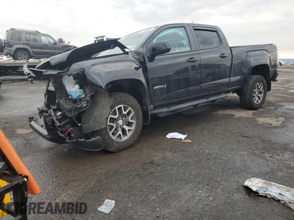 2022 GMC Canyon 4WD AT4 w/Cloth with VIN 1GTG6FEN7N1293630, listed as a Copart auction lot 89400665 with 19,261 mi miles and Salvage Title. Bid and sale history available at carsss.com. Image 1.