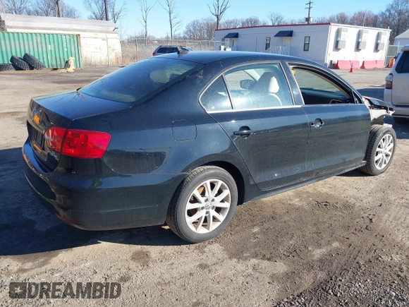 2013 Volkswagen Jetta Sedan SE w/Convenience/Sunroof with VIN 3VWDX7AJ9DM424595, listed as a IAAI auction lot 41807615 with 102,971 mi miles. Bid and sale history available at carsss.com. Image 4.