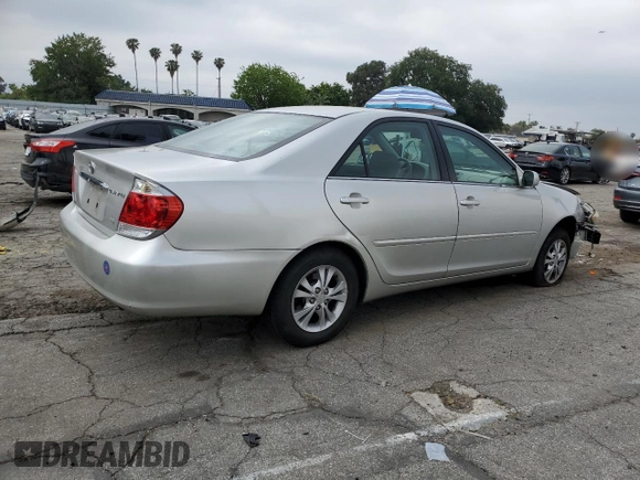 2005 Toyota Camry LE with VIN 4T1BF32KX5U601192, listed as a Copart auction lot 55365485 with 153,251 mi miles and Salvage Title. Bid and sale history available at DreamBid. Image 3.