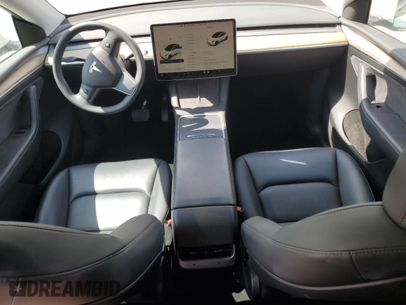 2023 Tesla Model Y Long Range z VIN 7SAYGDEE8PA030286, wystawiony jako Copart lot #50945465 z przebiegiem 43 676 mil mil oraz Szkoda całkowita • Salvage title. Historia ofert i sprzedaży dostępna na DreamBid. Obrazek 8.