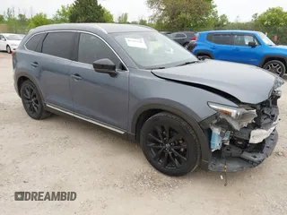 2023 Mazda CX-9 Grand Touring with VIN JM3TCBDY2P0636226, listed as a IAAI auction lot 42384360 with 161,352 mi miles and . Bid and sale history available at DreamBid. Image 1.