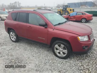 2012 Jeep Compass Latitude with VIN 1C4NJCEAXCD651896, listed as a Copart auction lot 86442794 with 92,181 mi miles and Salvage Title. Bid and sale history available at DreamBid. Image 4.