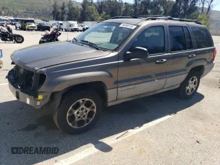 1999 Jeep Grand Cherokee Laredo с VIN 1J4G258S6XC606420, выставлен на аукционе Copart как лот 49896105 с пробегом 170 904 миль миль и Списание • Salvage title. История ставок и продаж доступна на DreamBid. Изображение 1.