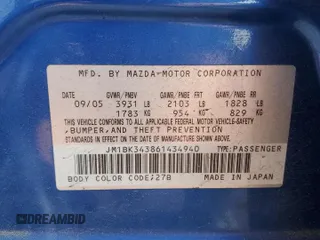 2006 Mazda 3 S Grand Touring with VIN JM1BK343861434940, listed as a Copart auction lot 63624024 with 56,737 mi miles and Salvage Title. Bid and sale history available at DreamBid. Image 12.