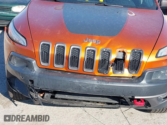 2014 Jeep Cherokee Trailhawk with VIN 1C4PJMBS4EW254879, listed as a IAAI auction lot 41550356 with 101,077 mi miles. Bid and sale history available at carsss.com. Image 6.